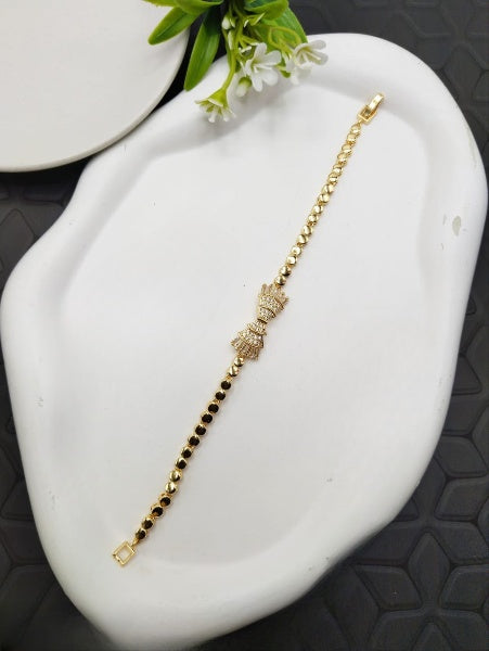 Stone Bow Bracelet – Elegant Gold-Plated Charm